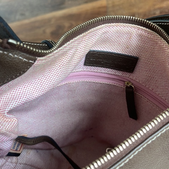 Dooney and Bourke. Brown leather shoulder bag. Has interior stains. - Picture 11 of 14